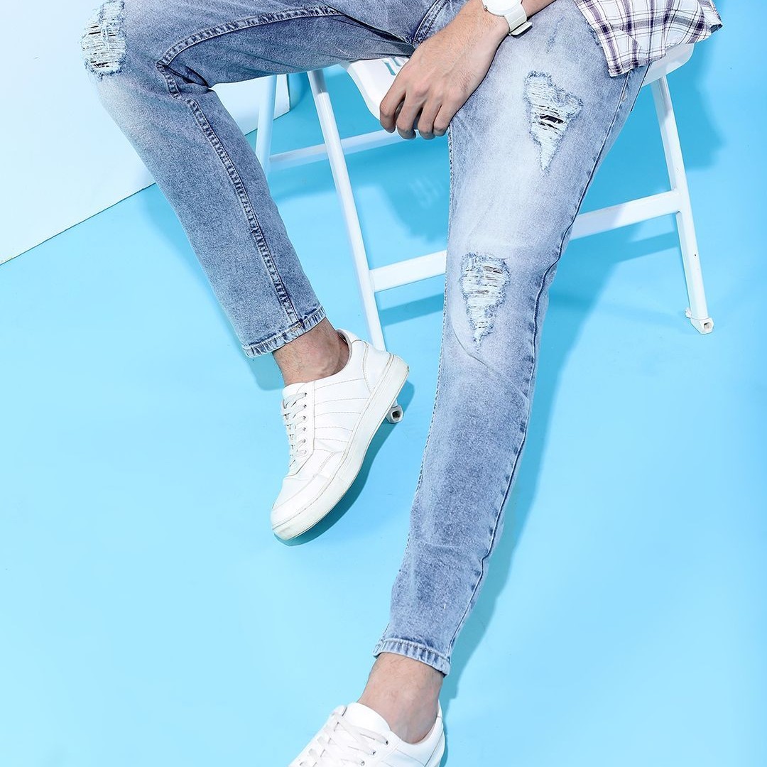 HIGHLANDER Men Tapered Fit Highly Distressed Mid-Rise Heavy Fade Stretchable Jeans